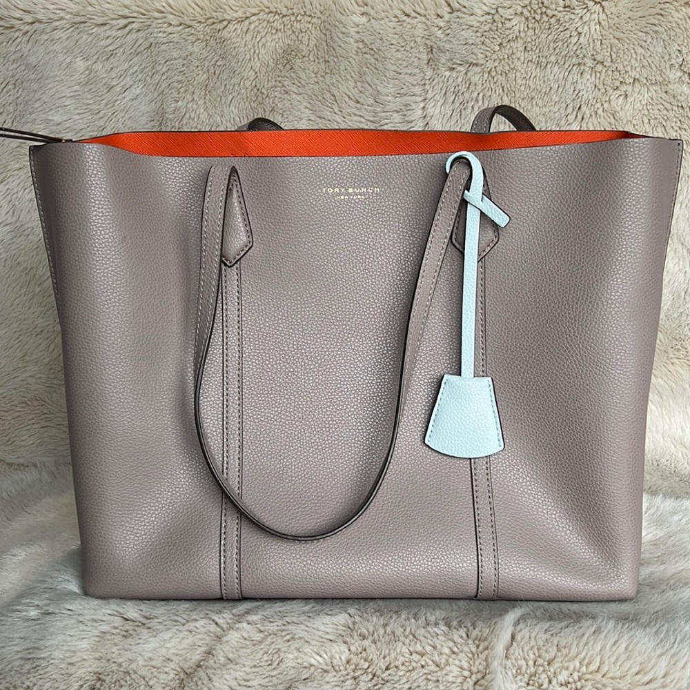 Tory Burch Taupe leathepurse with orange interior